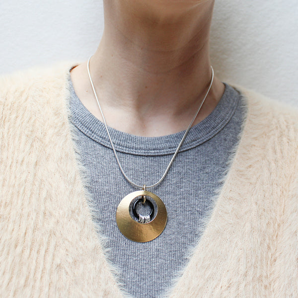 Cutout Disc with Black Ring and Accent Rings Necklace