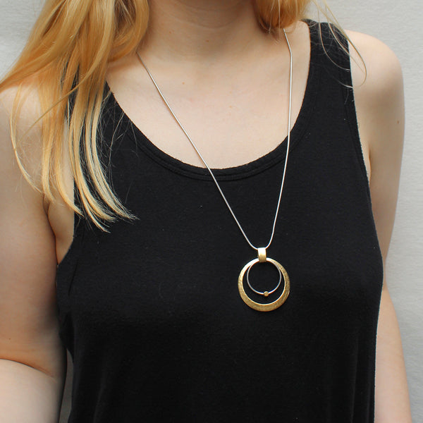 Cutout Disc with Ring and Bead Long Necklace