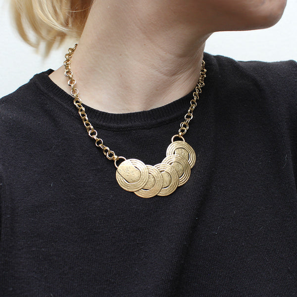Textured Rings and Swoop Necklace