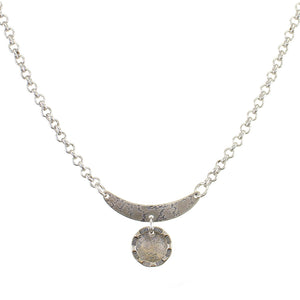 Curve with Disc and Patterned Ring Necklace