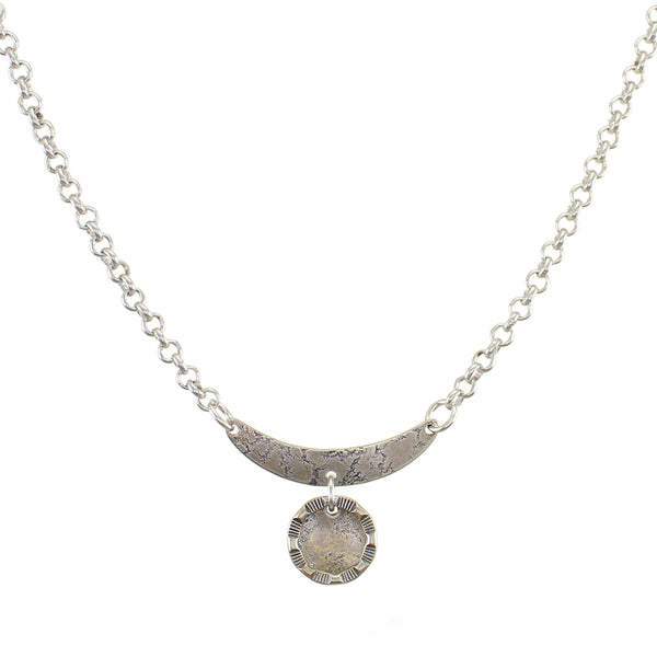 Curve with Disc and Patterned Ring Necklace