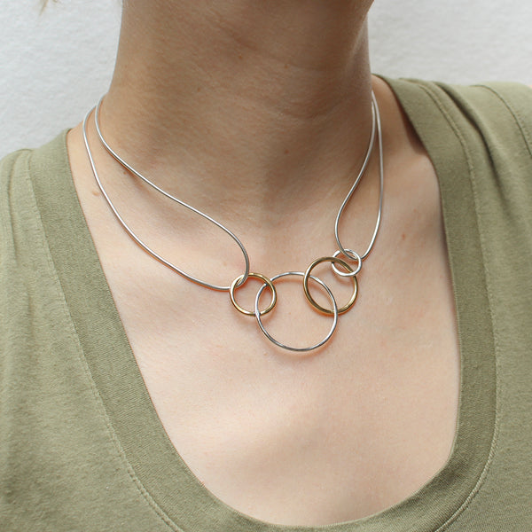 Four Intertwined Hammered Rings Necklace