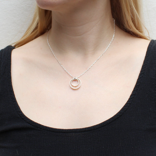 Small Tiered Rims on Delicate Chain Necklace