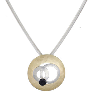 Large Cutout Disc with Layered Rings and Black Cabochon on Wide Snake Chain Necklace