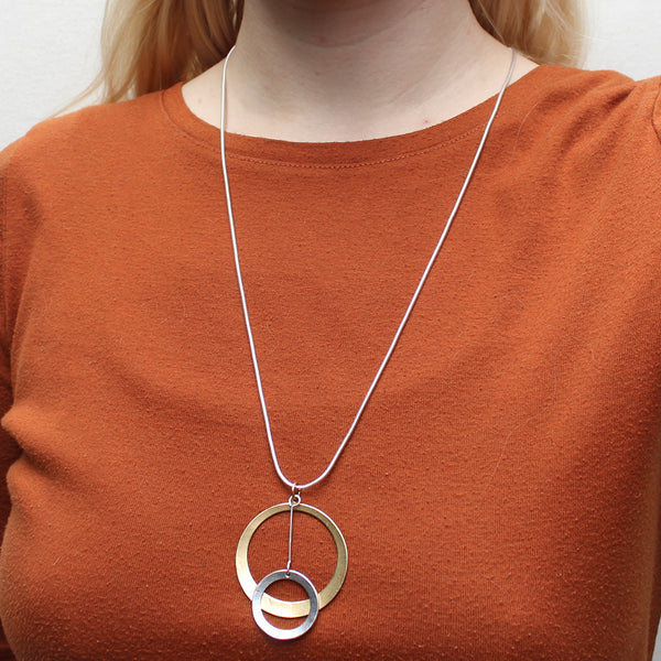 Dished Cutout Disc with Extended Ring Drop Long Necklace